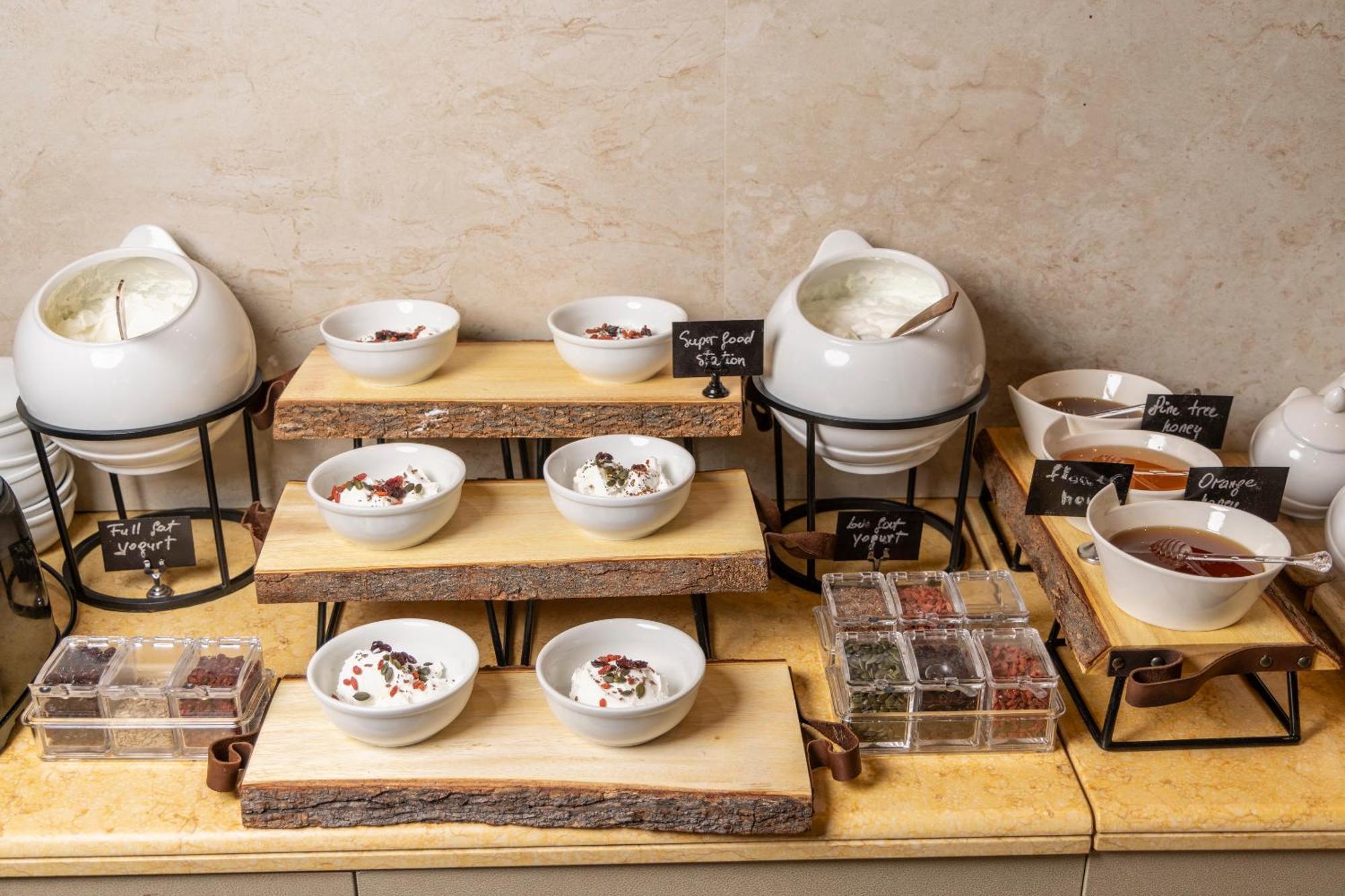 Alia Palace Hotel - Adults Only 16+ Chalkidiki Ngoại thất bức ảnh A selection of teas at a buffet